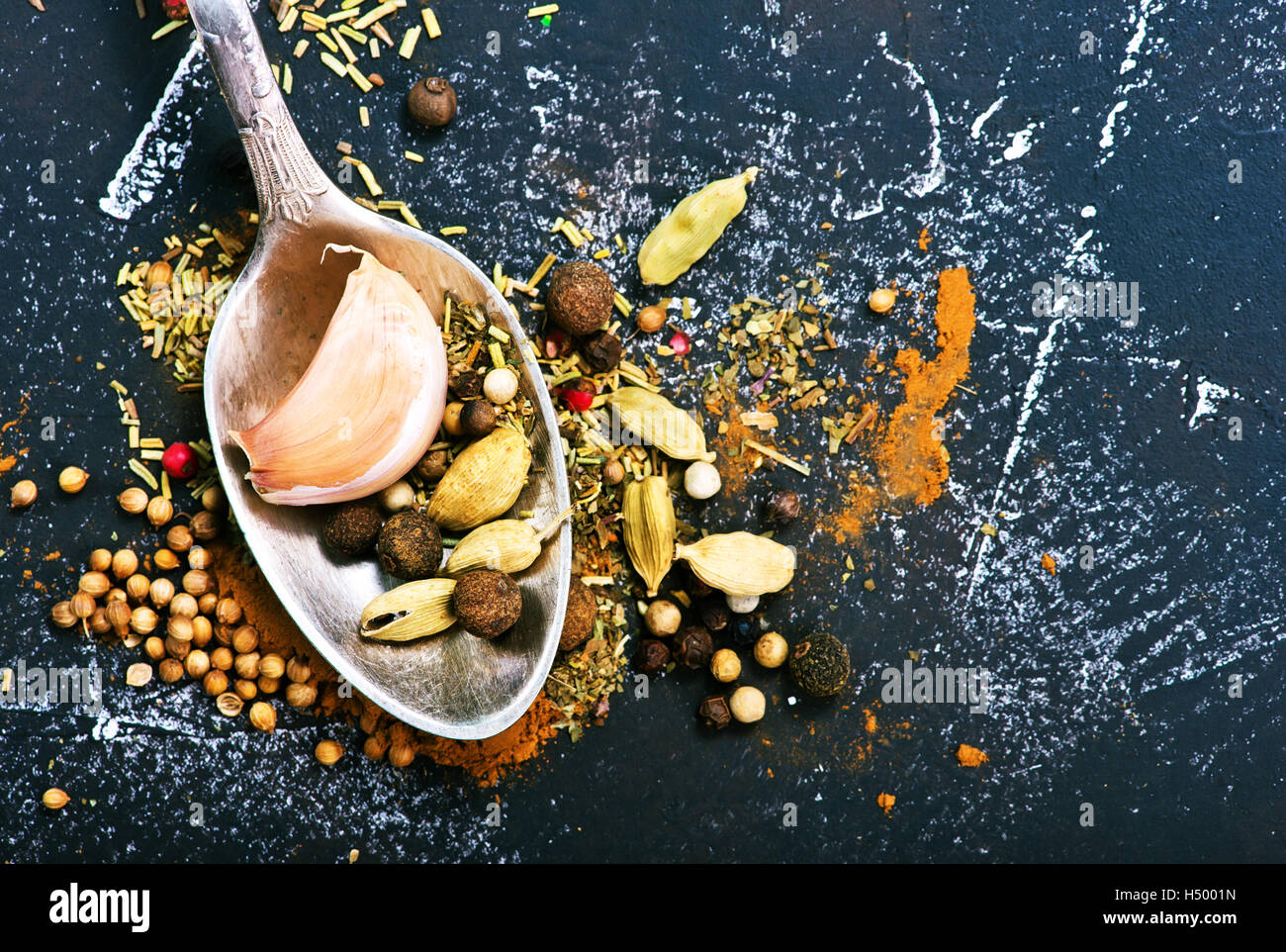 aroma spice and dry herbs on the black table Stock Photo Alamy