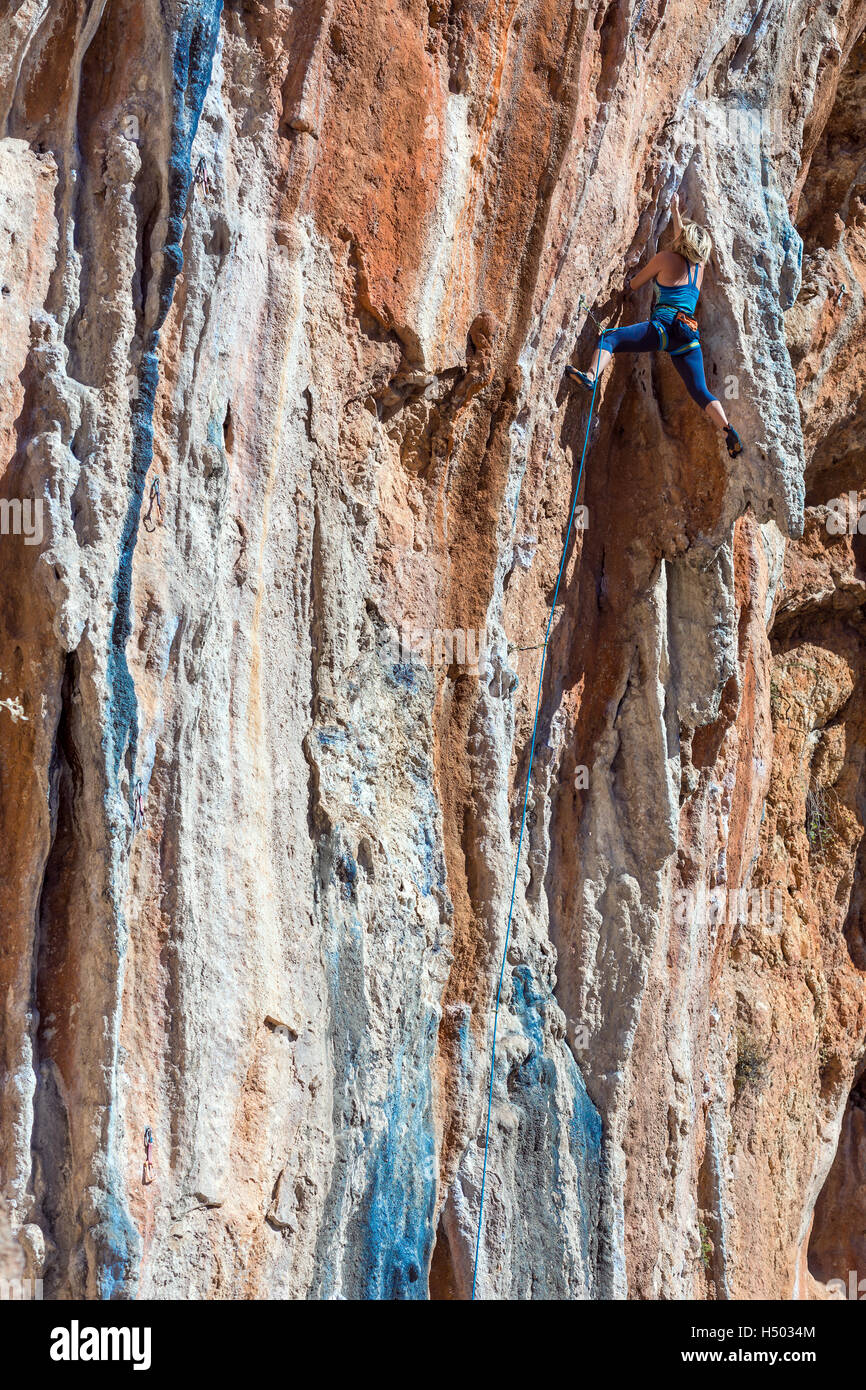 Female Mountain Climber lead climbing natural Rock Stock Photo Alamy