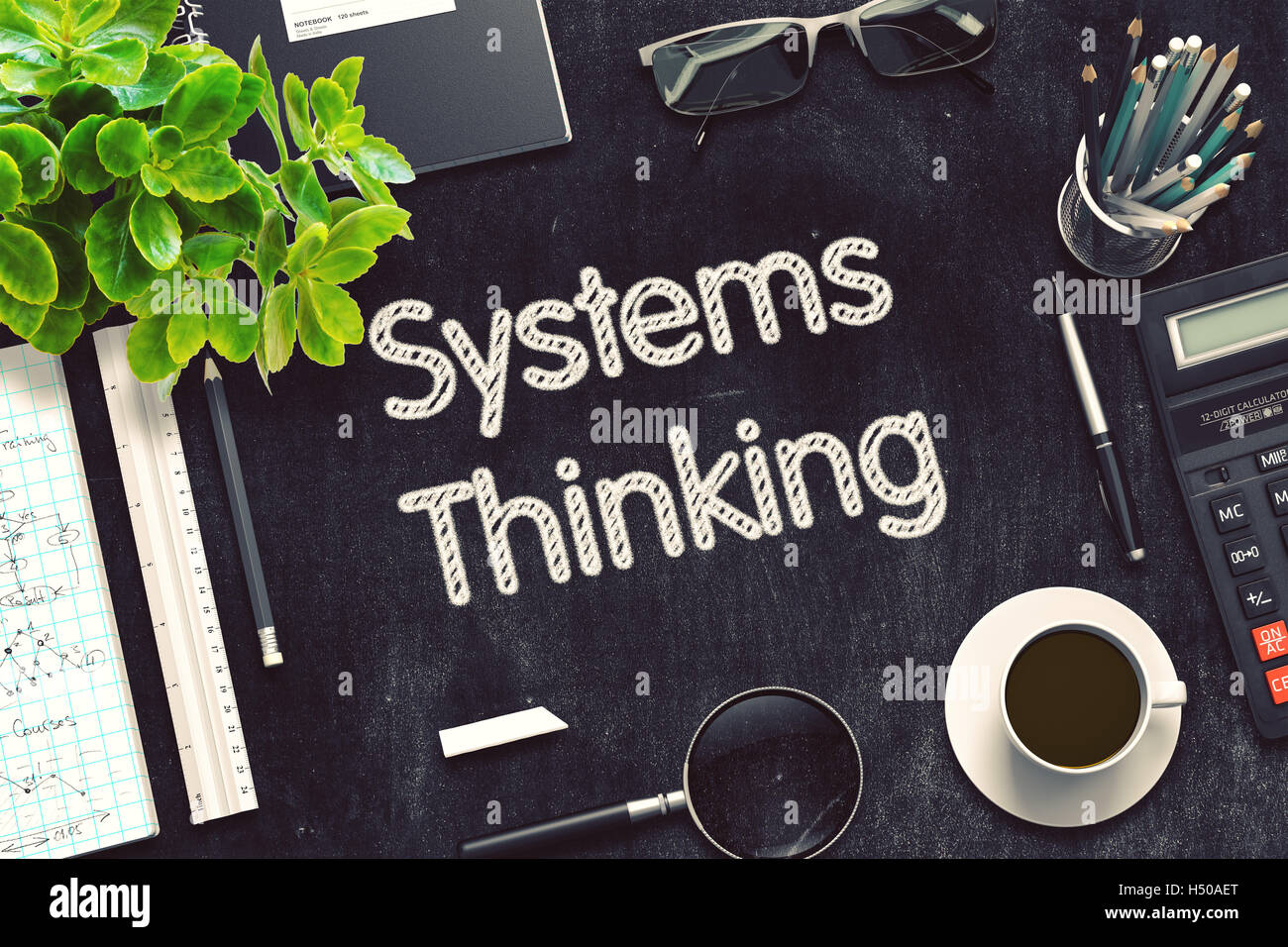 Systems Thinking on Black Chalkboard. 3D Rendering. Stock Photo