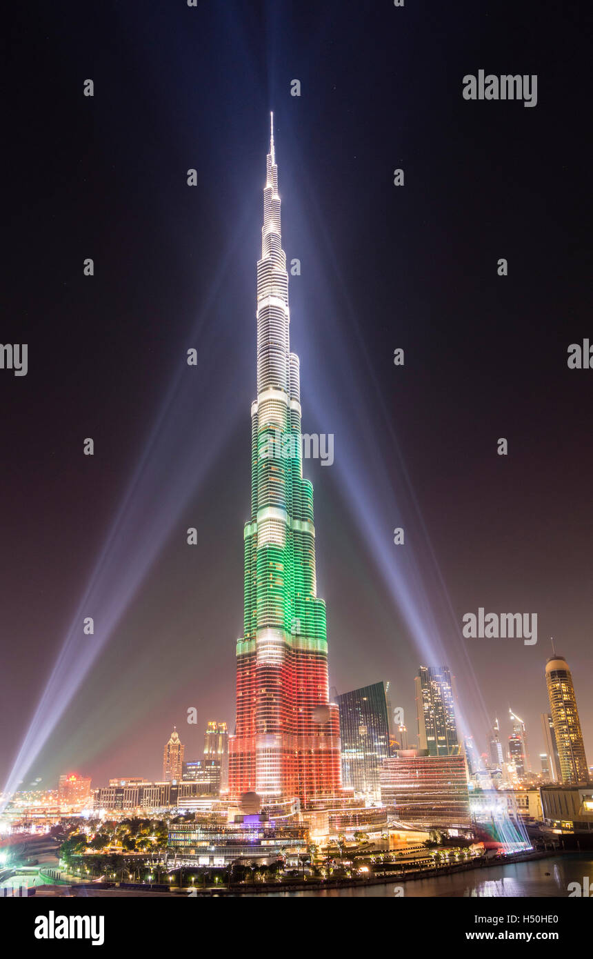 Evening view of Burj Khalifa skyscraper illuminated with national flag colours in Dubai United Arab Emirates Stock Photo