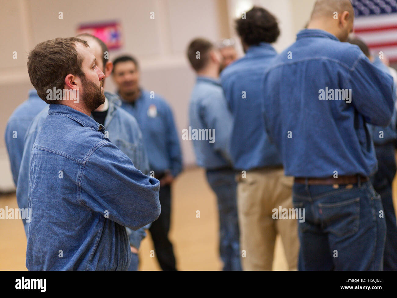Blue collar supporters at Hillary Clinton's Get Out the Vote event at Chicago Journeyman Plumber's Hall on March 14, 2016 in Chicago, Illinois. Stock Photo