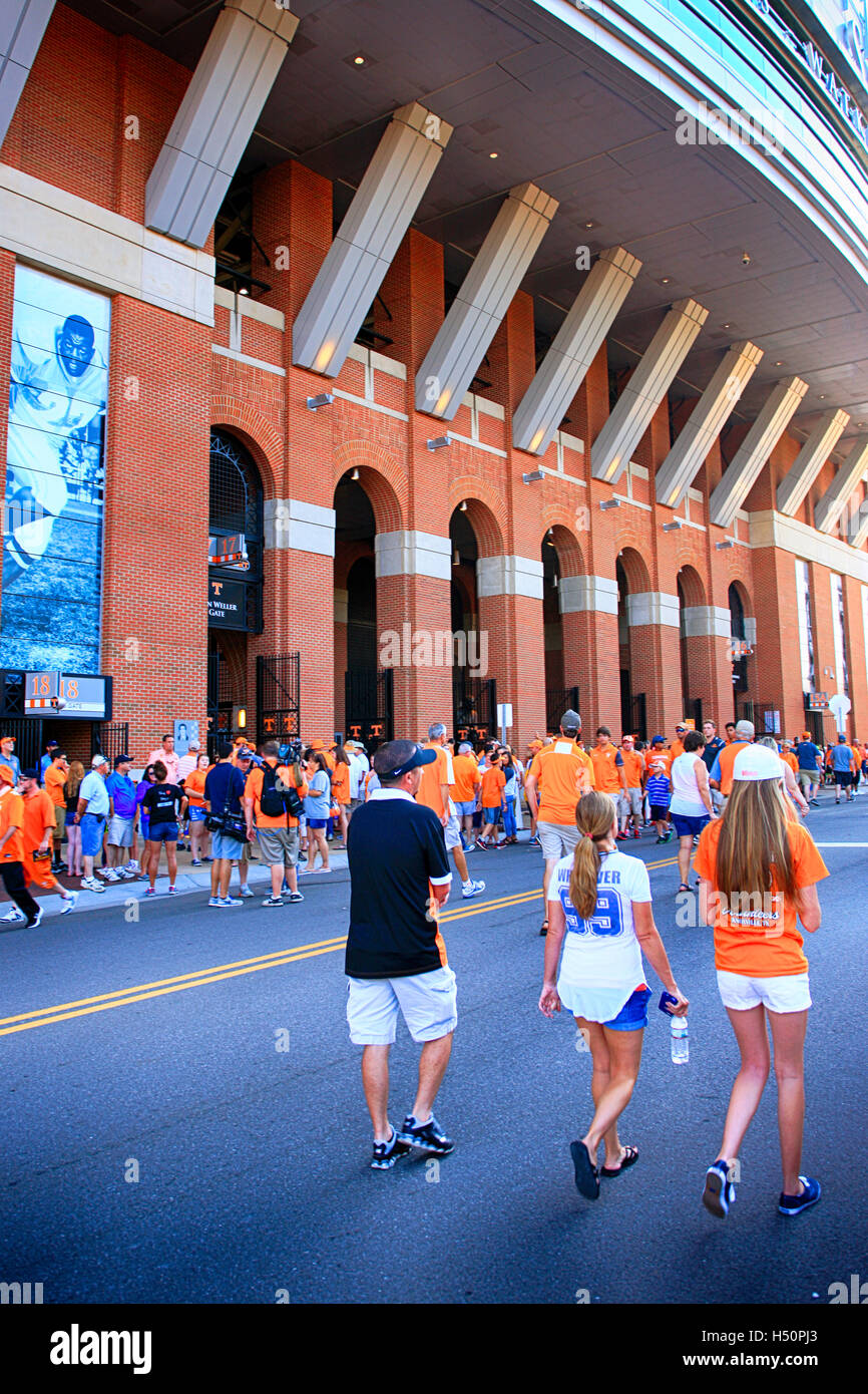 University Tennessee Volunteers supporters in orange apparel outside the Neyland Stadium in