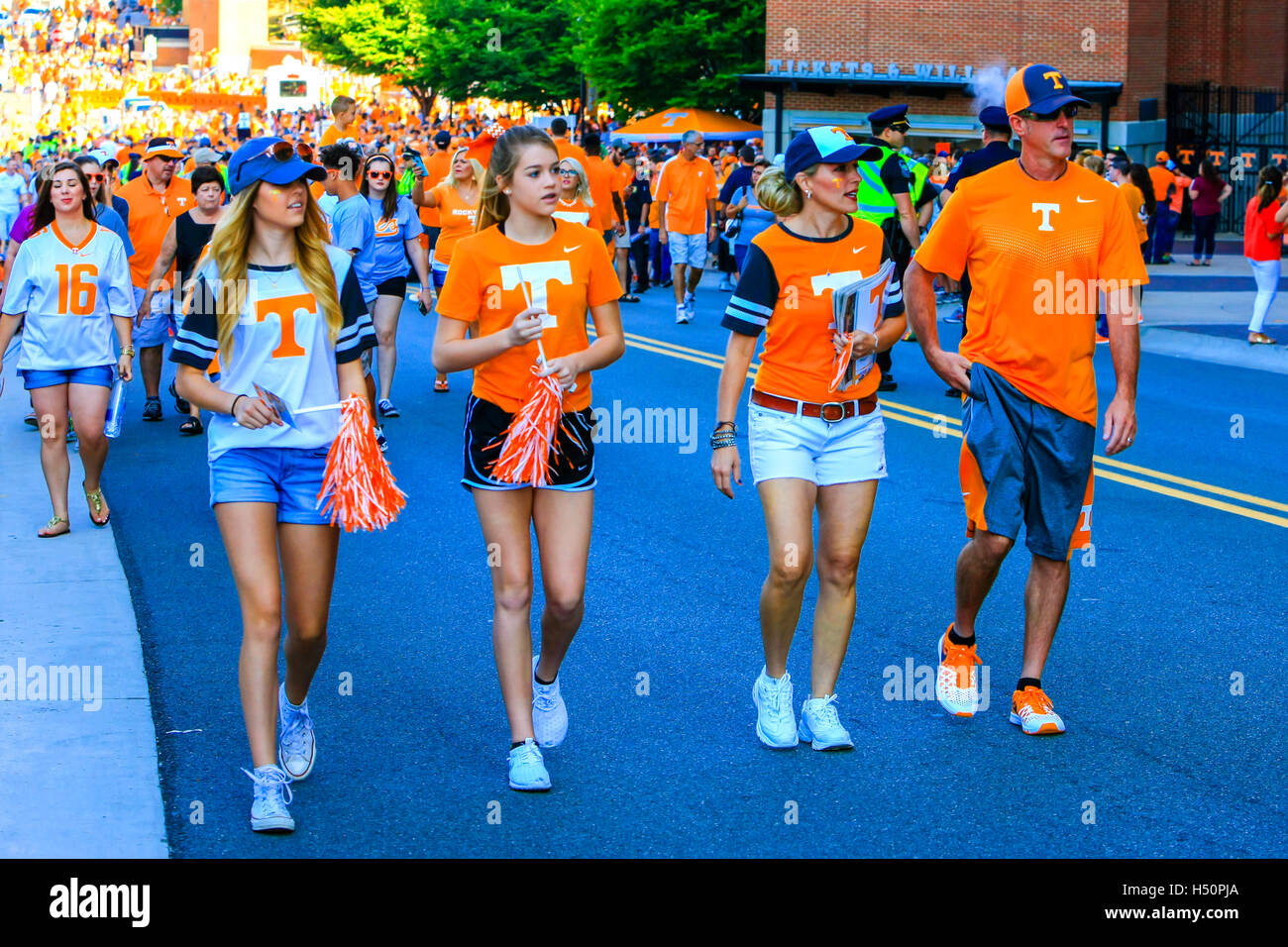 University Tennessee Volunteers supporters in orange apparel outside the Neyland Stadium in