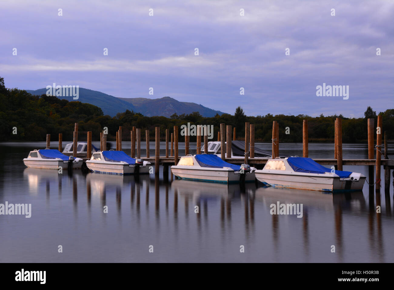 Pleasure boats moored up at Derwent Water , Cumbria, UK Stock Photo