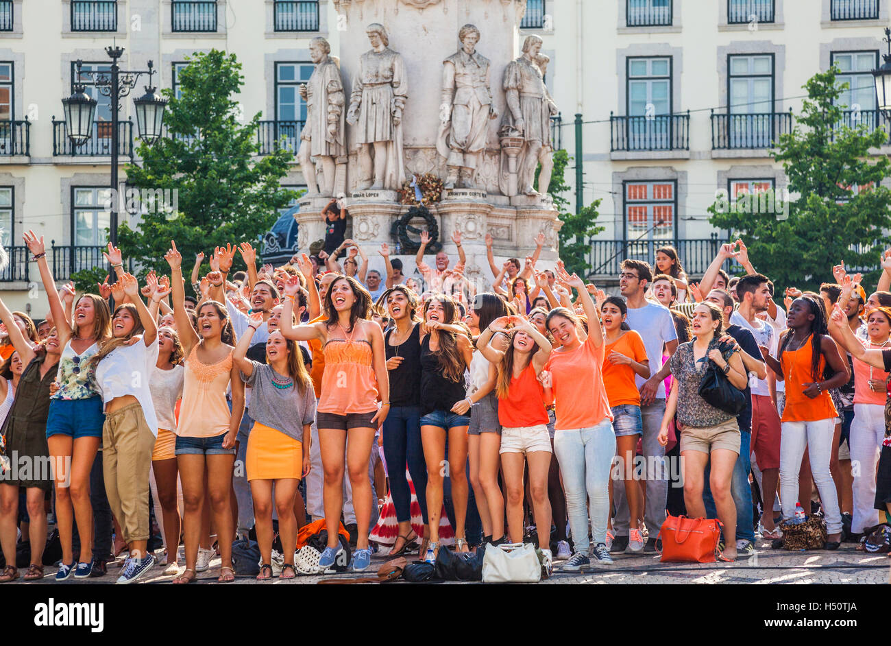 cheering crowd on Largo de Camoes, in the Lisbon neighborhood of Chiado, Lisbon, Portugal Stock Photo