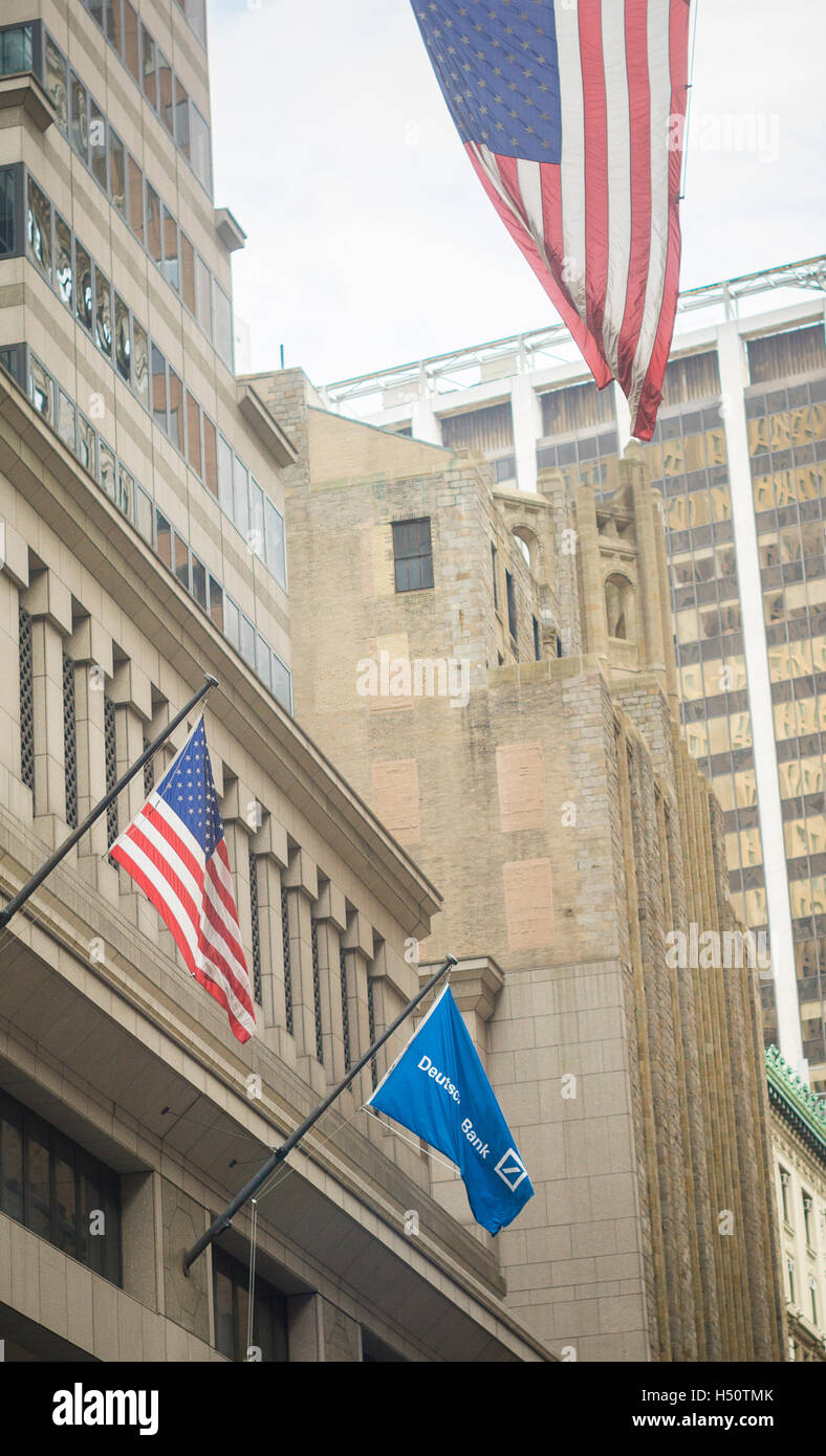 A Flag Flies Outside The Deutsche Bank Headquarters On Wall Street