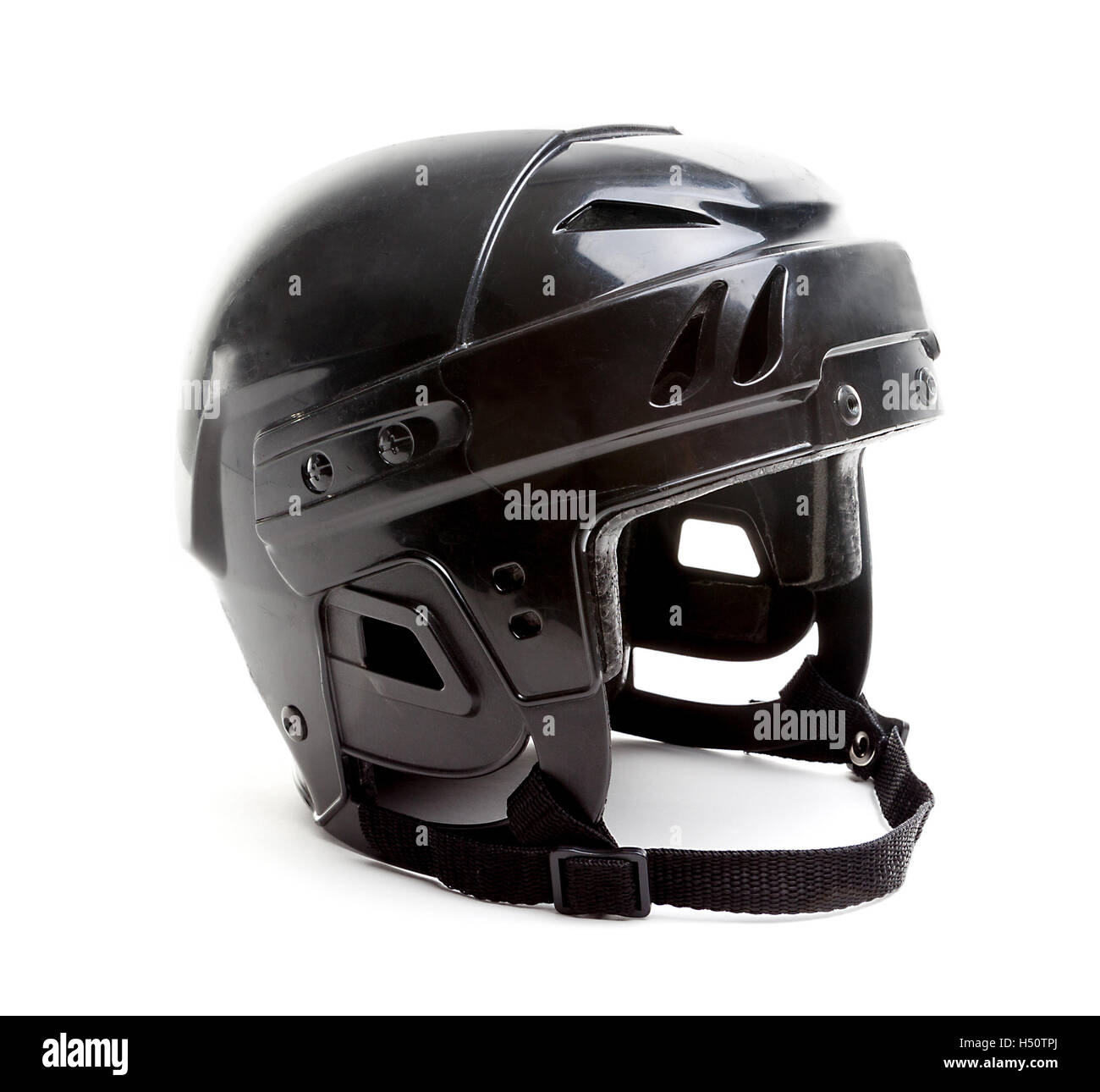 A black ice hockey helmet isolated on white background. Stock Photo