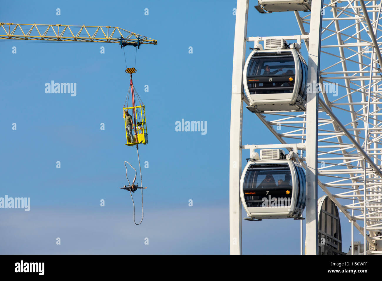 North sea beach at Scheveningen, coastal district of The Hague, Netherlands, seaside pier, ferris wheel, bungee jump tower, Stock Photo