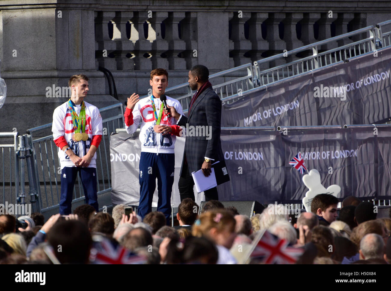 London, UK. 18th October, 2016. Heroes Return celebrations to welcome the Olympic and Paralympic competitors from Rio 2016. Ore Oduba interviewing Tom Daley and Max Whitlock interviewed Credit:  PjrNews/Alamy Live News Stock Photo
