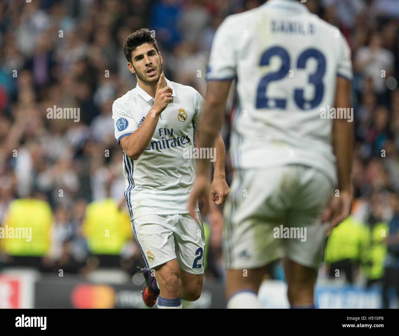 Madrid, Spain. 18th October, 2016. Real Madrid's Spanish midfielder Marco Asensio celebrating after scoring during the UEFA Champions League match between Real Madrid and Legia Warszawa at the Santiago Bernabeu Stadium in Madrid, Tuesday, October 18, 2016. Credit:  VWPics/Alamy Live News Stock Photo