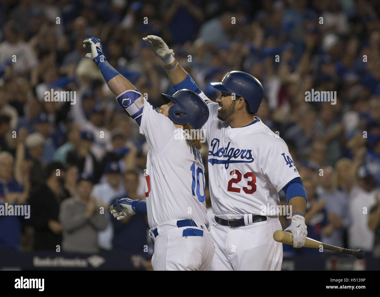 Los Angeles, CALIFORNIA, UNITED STATES OF AMERICA, USA. 18th Oct, 2016. Adrian Gonzalez celebrates with Justin Turner (10) of the Los Angeles Dodgers after hitting a home run against the Chicago Cubs in the fifth inning of game three of the National League Championship Series at Dodger Stadium on October 18, 2016 in Los Angeles, California.Los Angeles Dodgers won the game 6-0 to take the lead 2 games to 1 .ARMANDO ARORIZO Credit:  Armando Arorizo/Prensa Internacional/ZUMA Wire/Alamy Live News Stock Photo