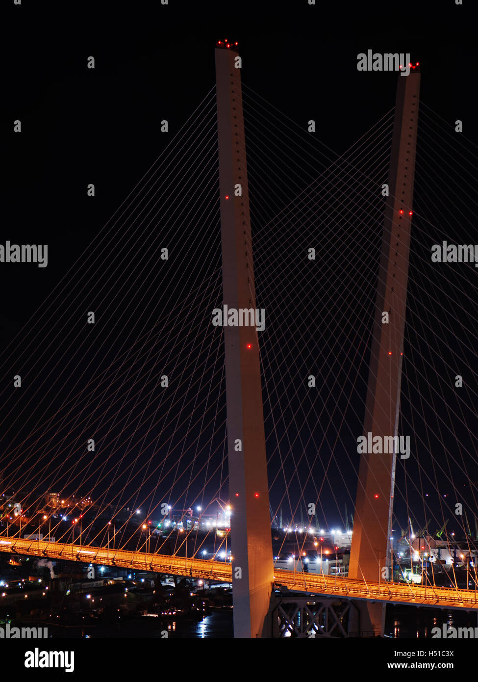 night view of the bridge in the Russian Vladivostok over the Golden Horn bay Stock Photo