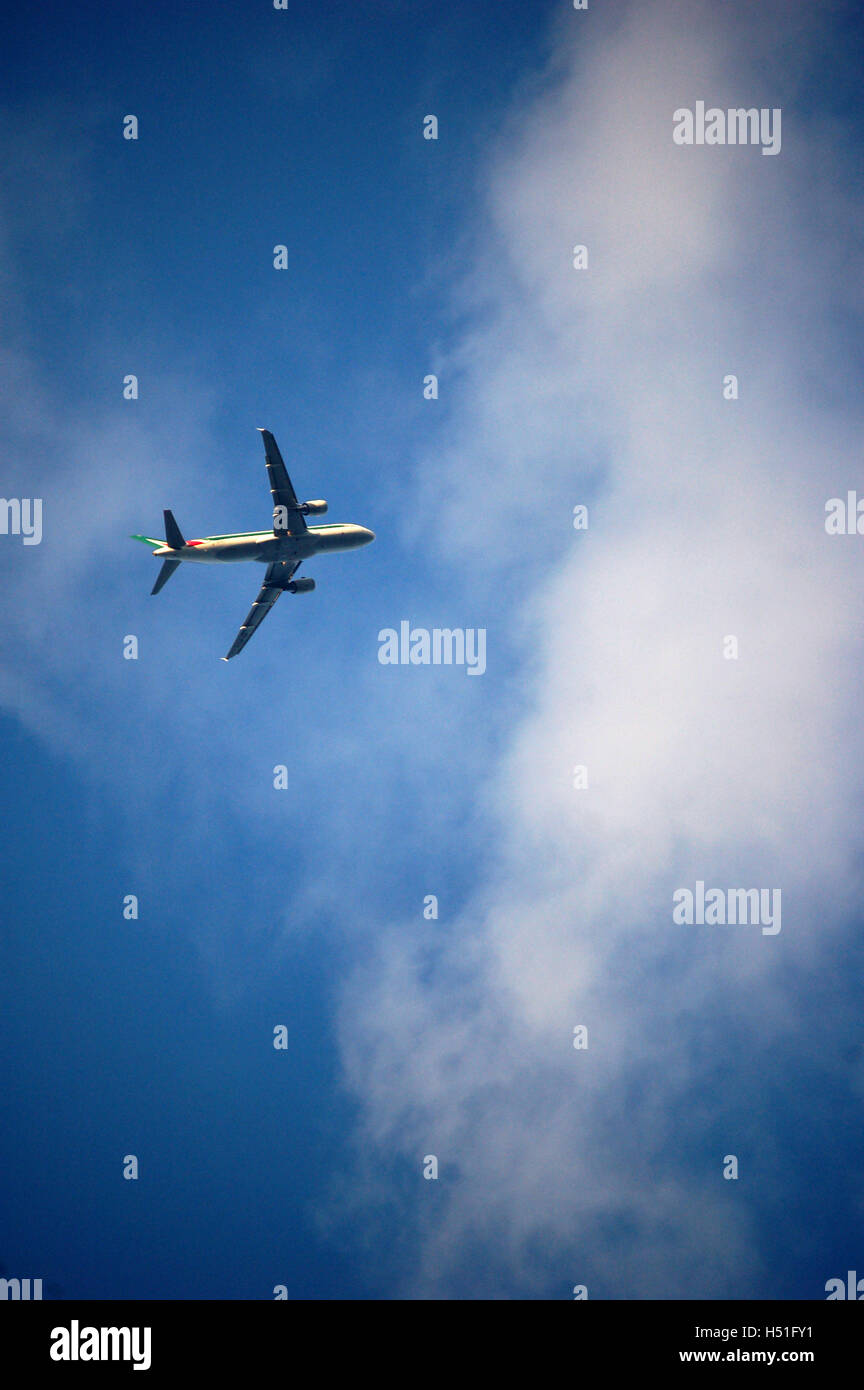commercial airplane in flight Stock Photo