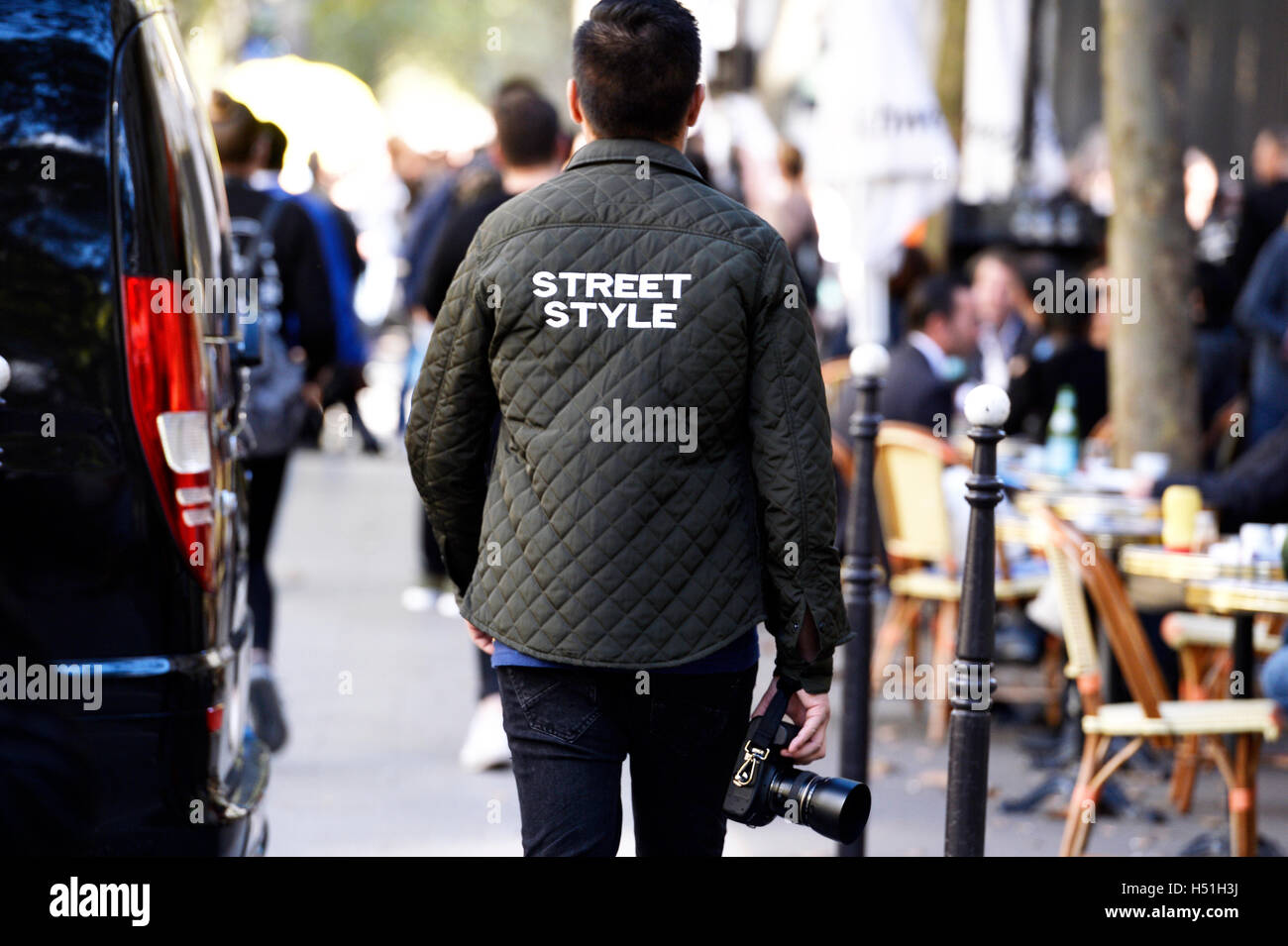 Street Style Photographer at Paris Fashion Week RTW S/S 2017 Stock Photo