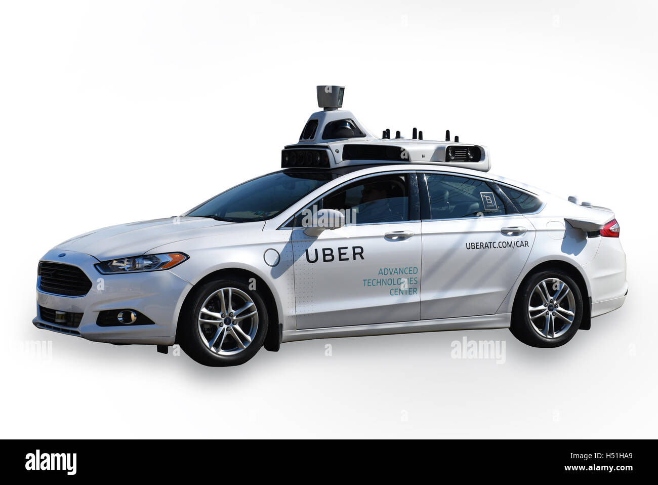 A Driverless Self Driving car being tested by Uber the taxi service company in Pittsburgh, PA cut out Stock Photo