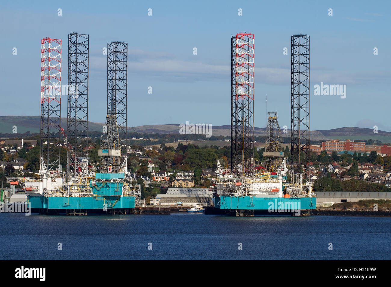 Oil rigs Rowan Stavanger and Rowan Norway side by side at Prince Charles Wharf undergoing maintenance repairs in Dundee, UK Stock Photo