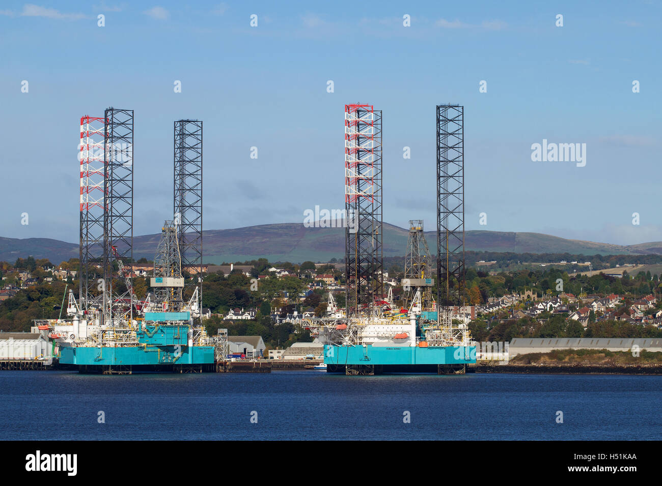 Oil rigs Rowan Stavanger and Rowan Norway side by side at Prince Charles Wharf undergoing maintenance repairs in Dundee, UK Stock Photo