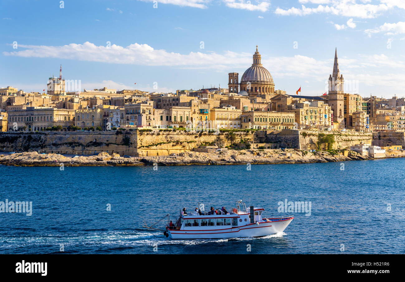Passenger boat passing Marsamxett Harbour in Malta Stock Photo - Alamy