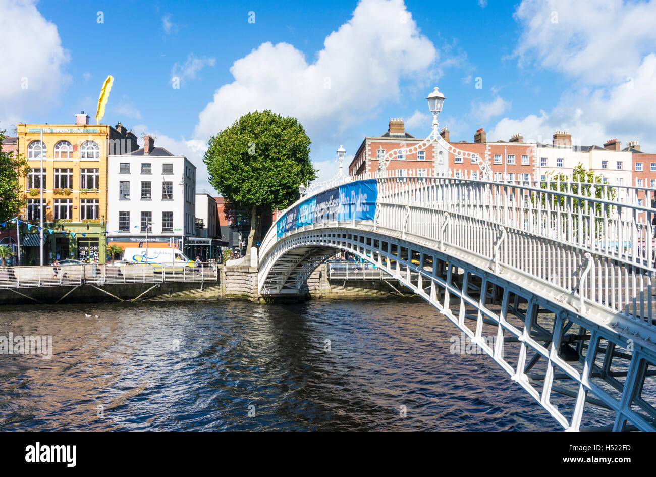 Ha'penny or Halfpenny Bridge over River Liffey Dublin Ireland Europe EU Stock Photo