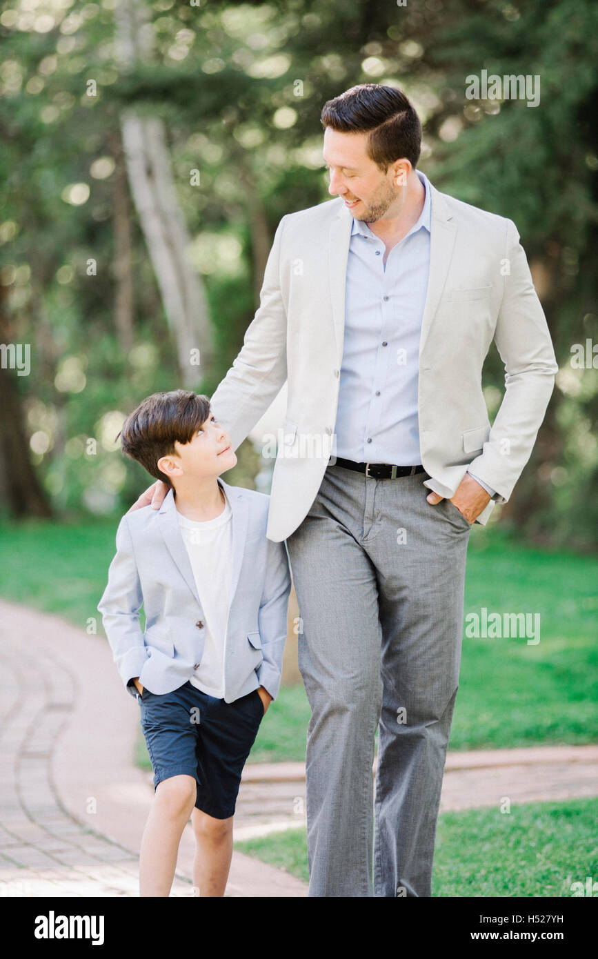Father hugging teen son hi-res stock photography and images - Alamy