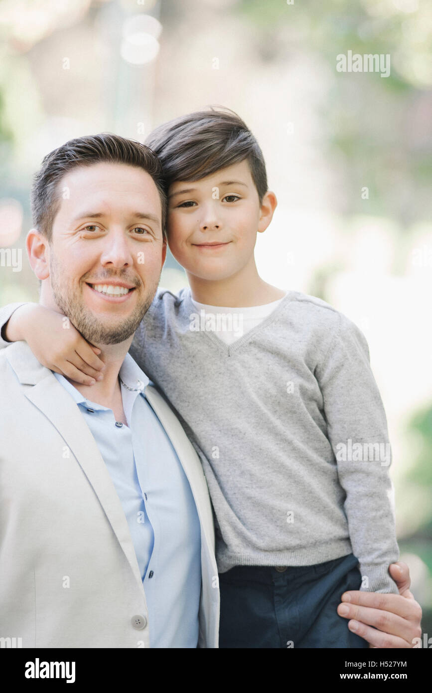 Father hugging teen son hi-res stock photography and images - Alamy