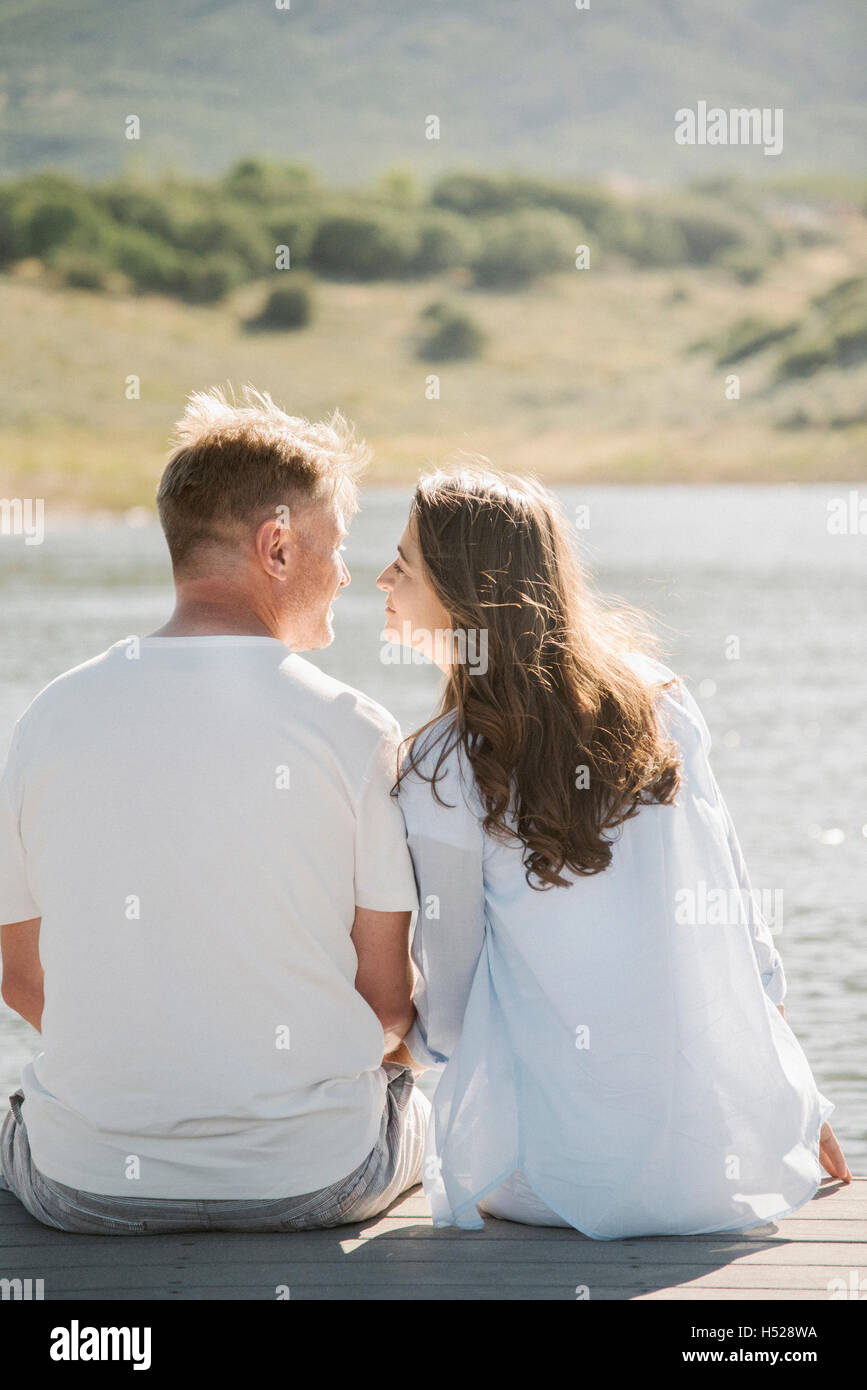 Woman sitting on man hi-res stock photography and images - Alamy