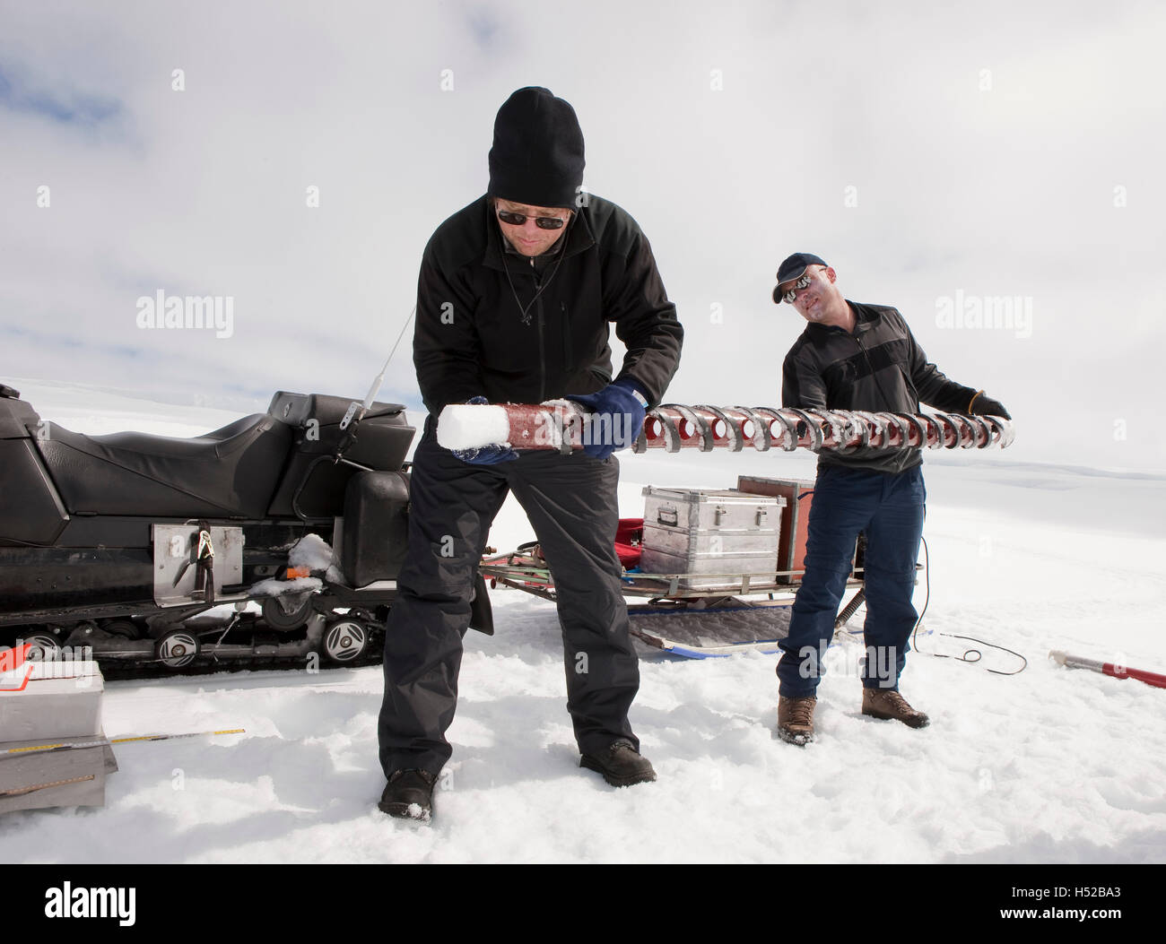 Scientists with ice core samples doing glacial research on Vatnajokul Ice Cap, Iceland Stock Photo