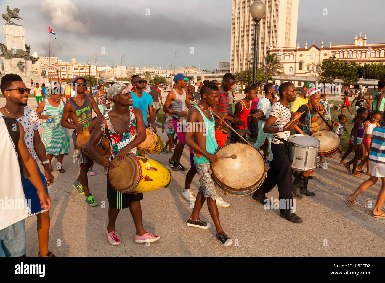 A group of musicians moving through Antonio Maceo Park in Central Havana, Cuba. Stock Photo