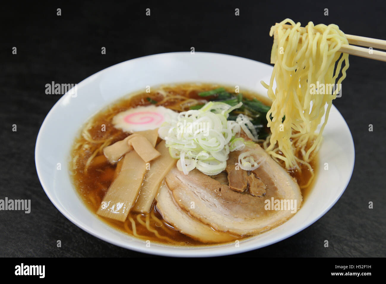 Ramen noodles in soysauce flavored soup Stock Photo Alamy