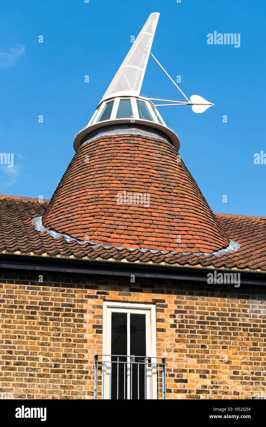 Conical chimney atop a former malting mill, Ware, Hertfordshire Stock Photo