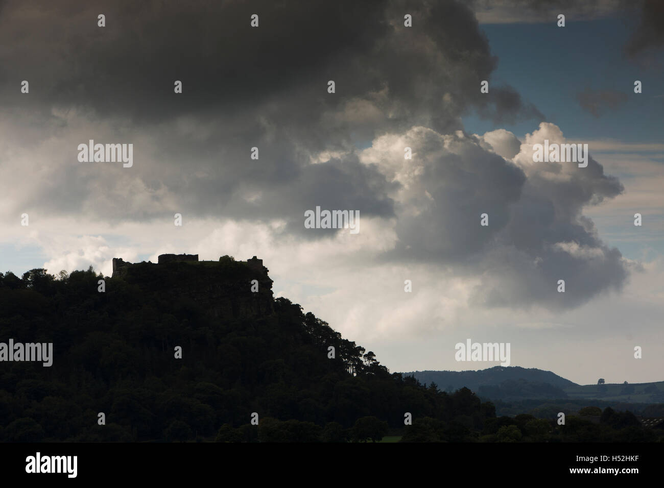 UK, England, Cheshire, Beeston, castle ruins silhouetted against sky Stock Photo
