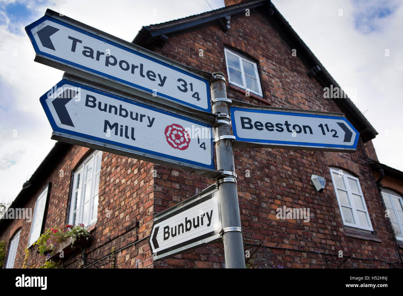 UK, England, Cheshire, Bunbury, Vicarage Lane, road direction signs