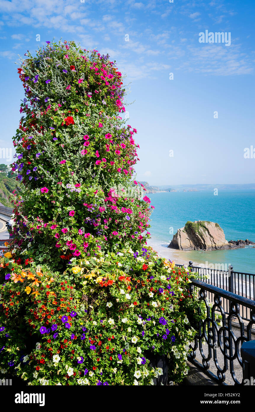 A tall floral column on the seafront in Tenby Dyfed South Wales Stock Photo