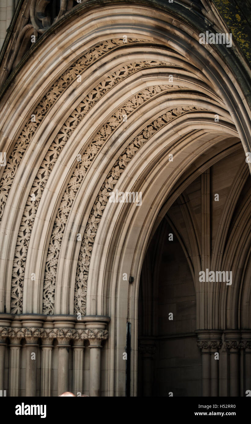 Decorative feature stonework on the Arched entrance to building showing ...