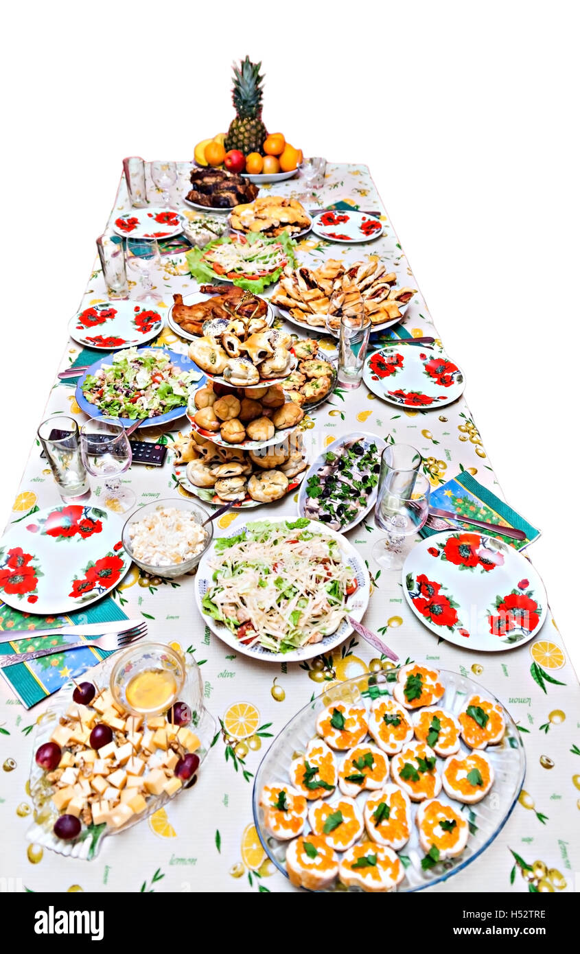 holiday table with dishes, with different dishes, salads. Stock Photo