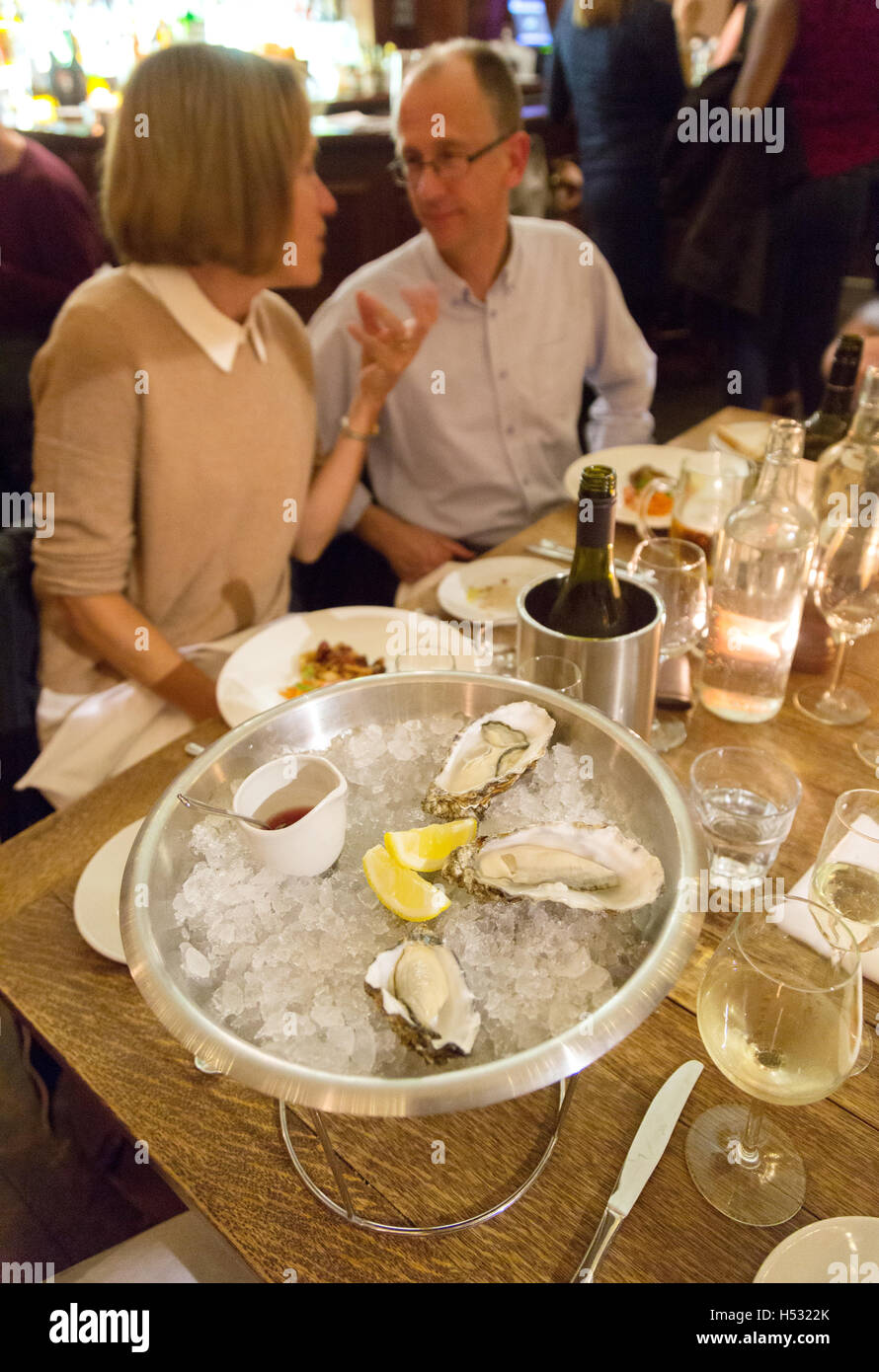 Oysters on a plate, the Ginger Pig restaurant, Brighton and Hove, Sussex, UK Stock Photo