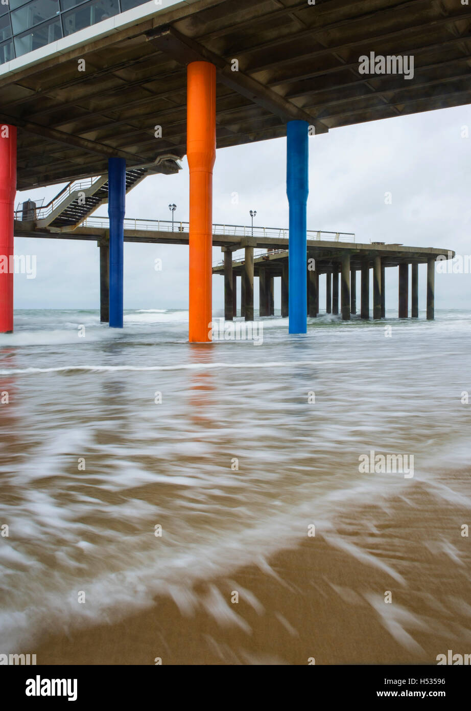 The colorful pillars of Scheveningen Pier near The Hague in the Netherlands Stock Photo