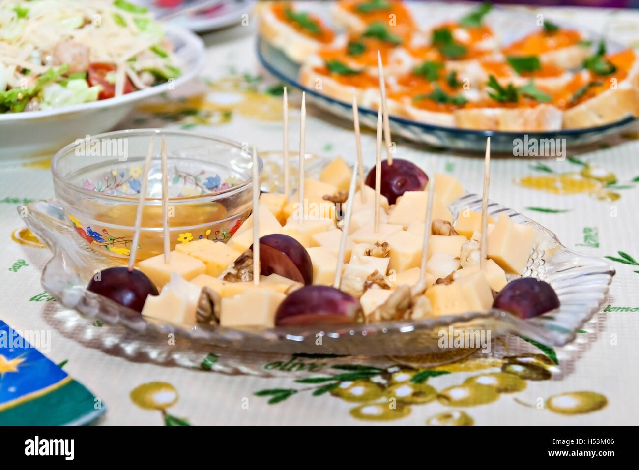 standing buffet cheese plate with grapes Stock Photo Alamy