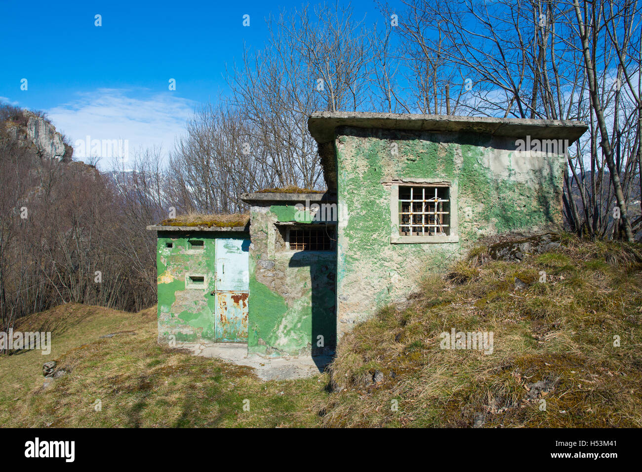 Hunting cabin in the meadow in the mounta Stock Photo