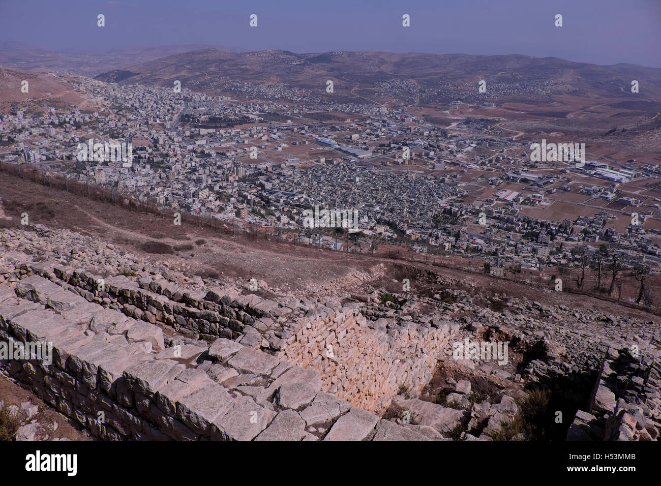 View toward Nablus Governorate area from ruins of a Hellenistic citadel on Mount Gerizim one of the highest peaks in the West Bank near the city of Nablus in the West Bank, Israel on 18 October 2016. The Samaritans who trace their roots to the northern Kingdom of Israel in what is now the northern West Bank regard mount of Gerizim, rather than Jerusalem's Temple Mount, as having been the location chosen by God for a holy temple. Stock Photo