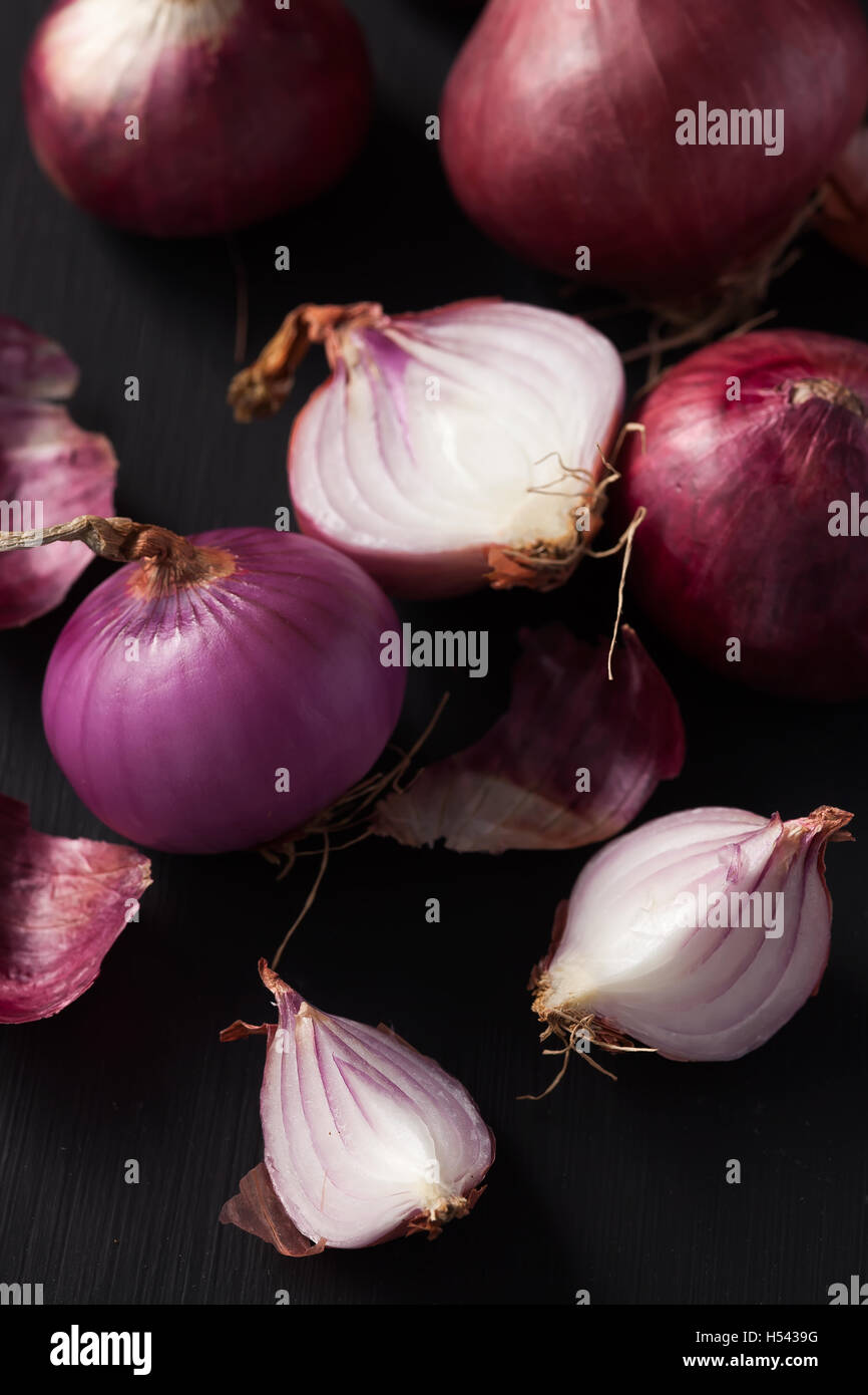 shallots still life black background onion bulb season herb vegetable ingredient Stock Photo Alamy