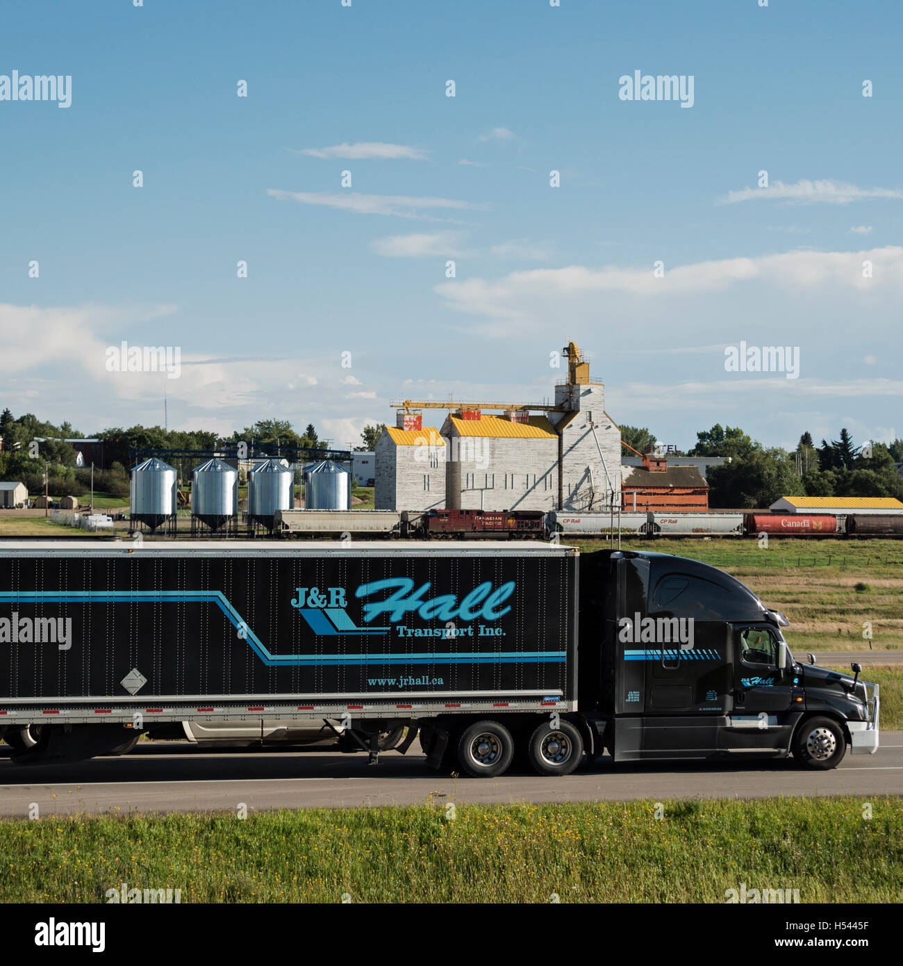 Canada Canadian rural prairie scene semi tractor trailer rig driving ...