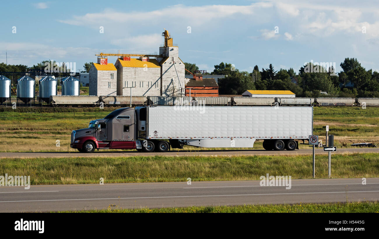 Canada Canadian rural prairie scene semi tractor trailer rig driving ...