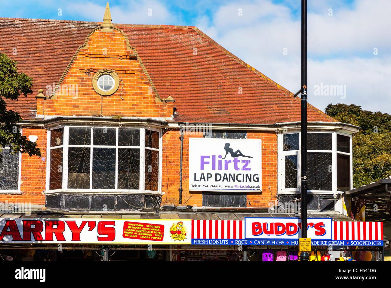 Lap dancing club sign Flirtz Skegness Lincolnshire clubs above shops nightclub UK England GB Stock Photo