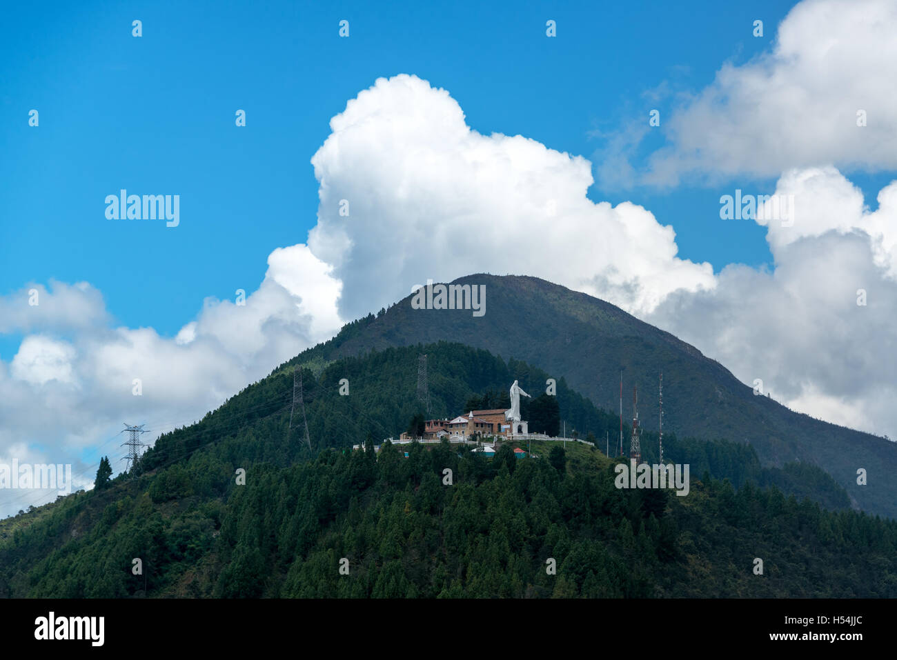 View of Guadalupe Hill with a statue of the Virgin of Guadalupe on it overlooking Bogota, Colombia Stock Photo