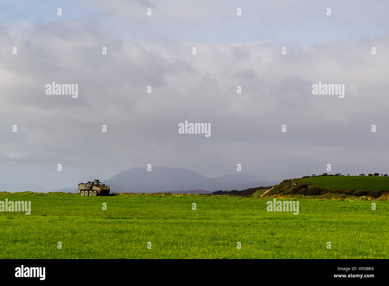 Mowag APC military vehicle of the Irish Army patrols Bantry Airstrip, County Cork, Ireland during an exercise with copy space. Stock Photo