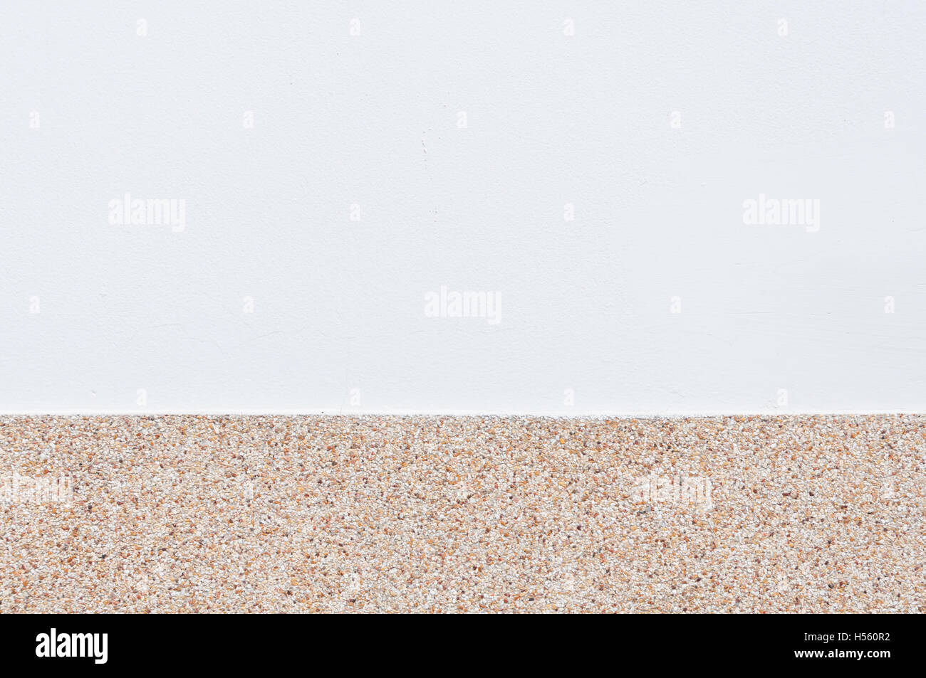 Cement wall texture and small gravel stone texture. Stock Photo