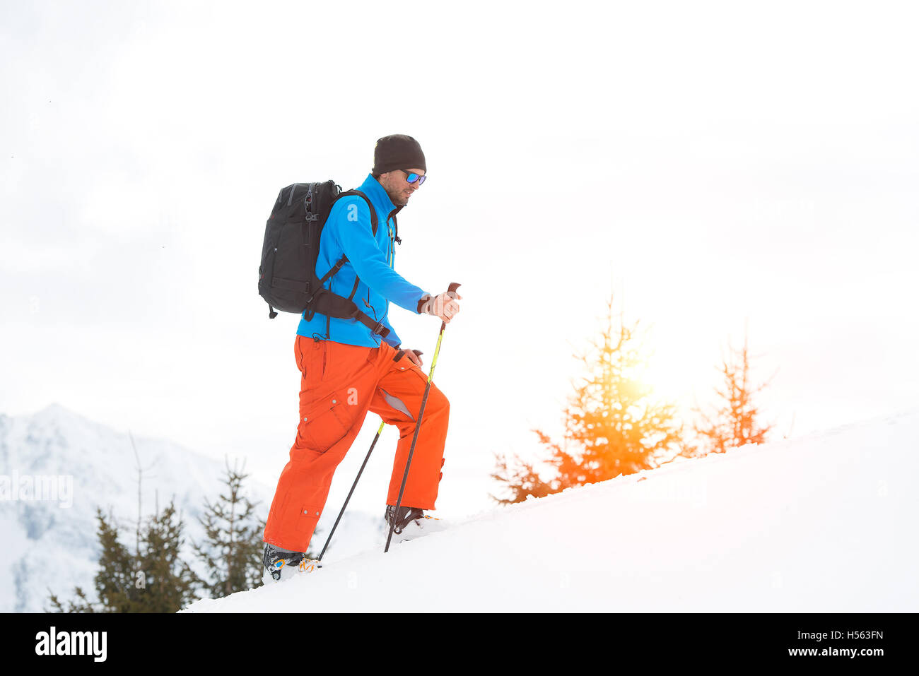 Uphill with skins under the skis Stock Photo Alamy