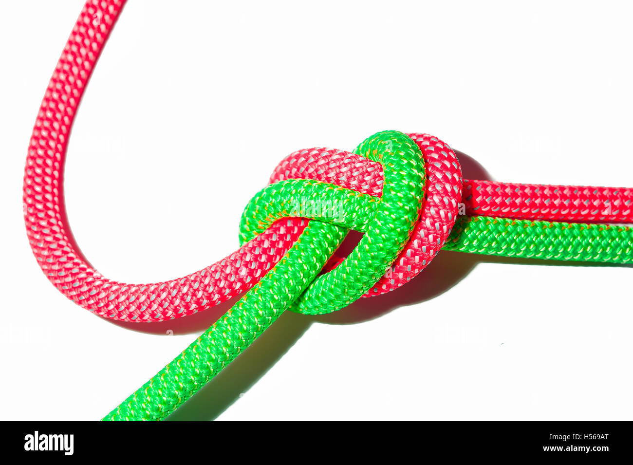 Ropes tied together by a node Stock Photo - Alamy