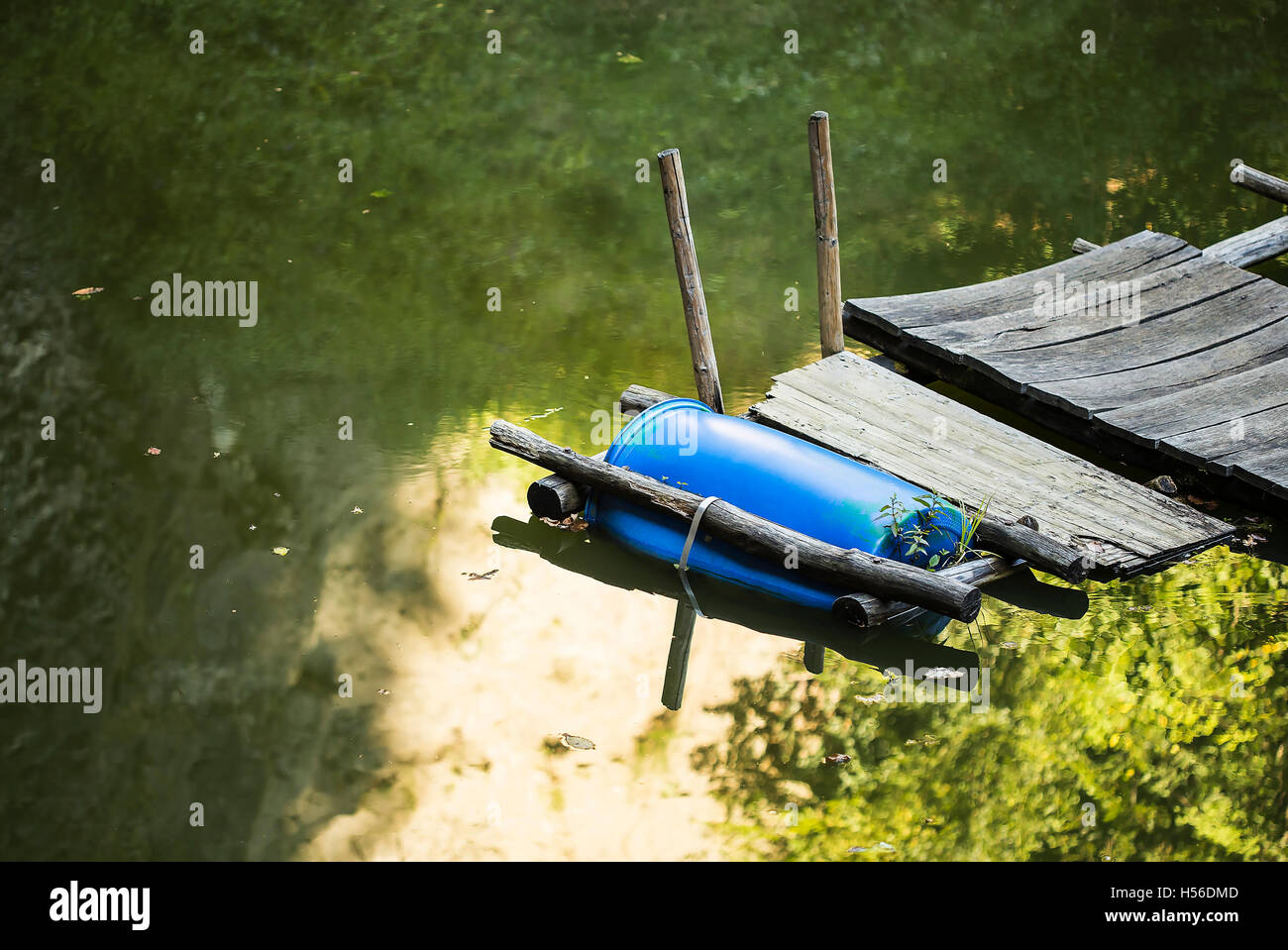 Floating plastic barrel dock in a river Stock Photo Alamy